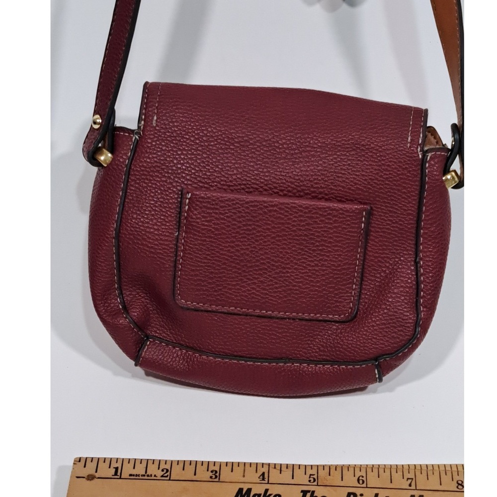 London Fog Burgundy Pebbled Faux Leather Crossbody Saddle Bag with Gold Padlock - Picture 11 of 12